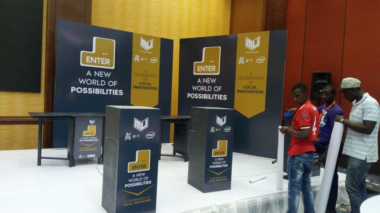 Branded conference set pieces reading A New World of Possibilities