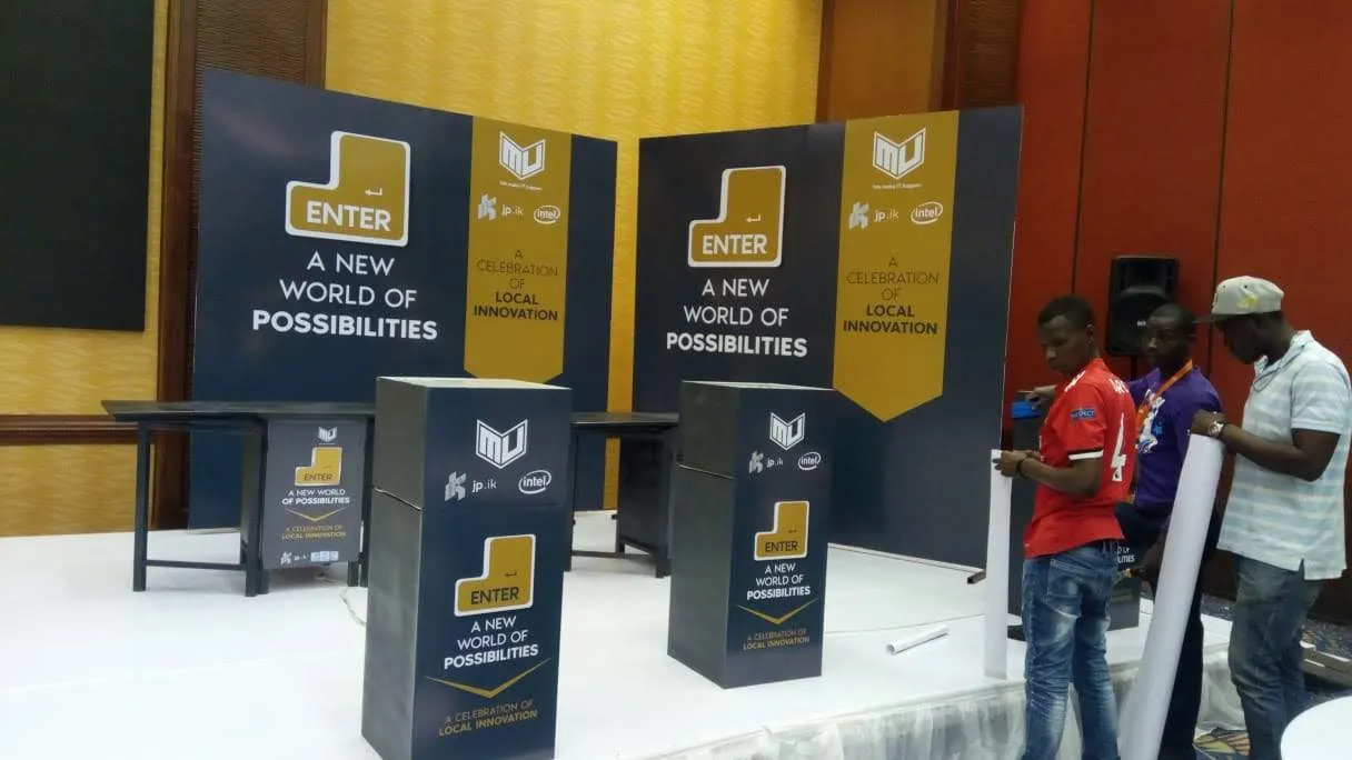 Branded conference stage being assembled